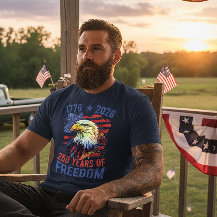 Man sitting on a wooden chair outdoors with American flags and a sunset in the background